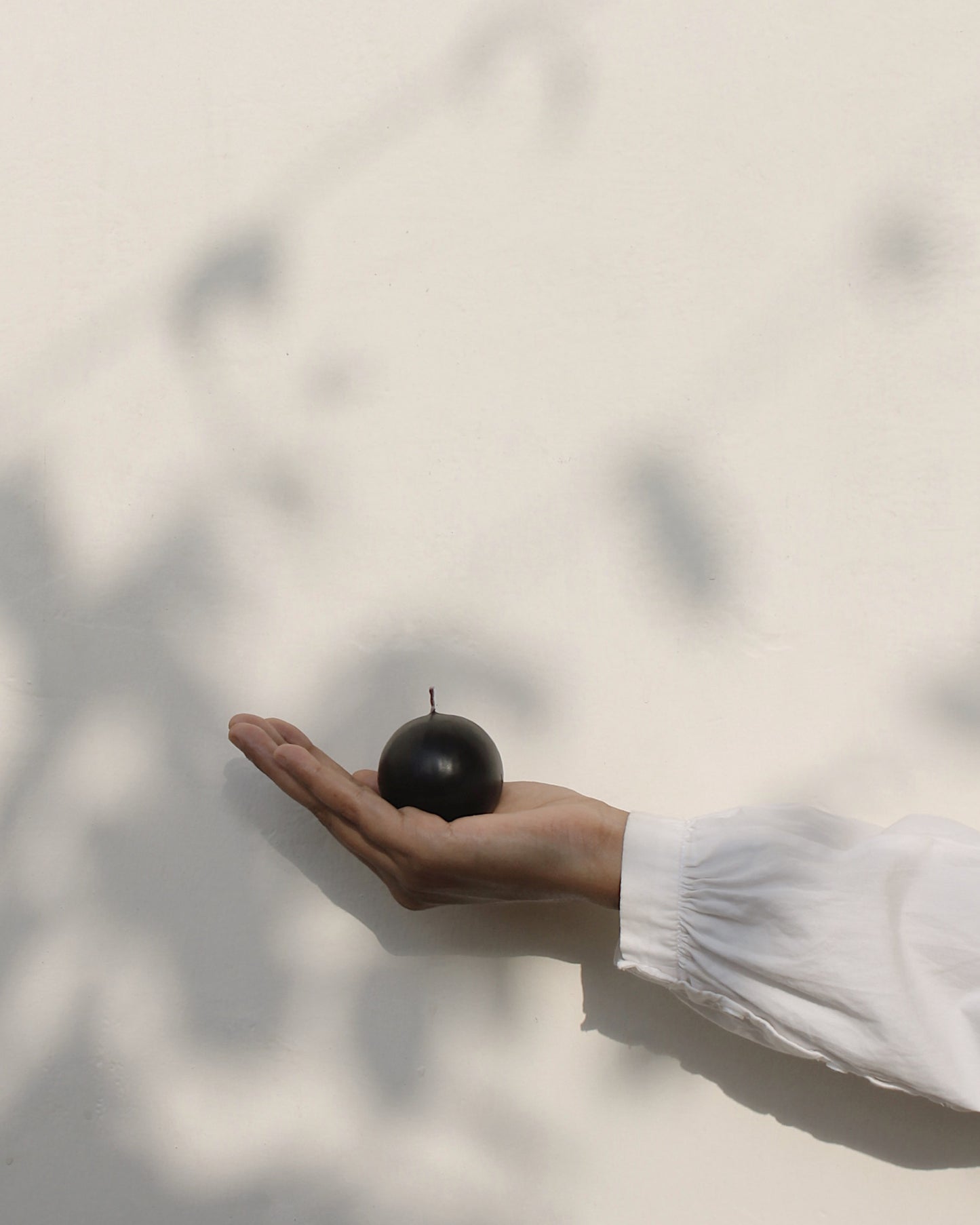 Round matte black candle
