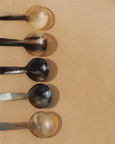 Bunch of mini spoons with horn material