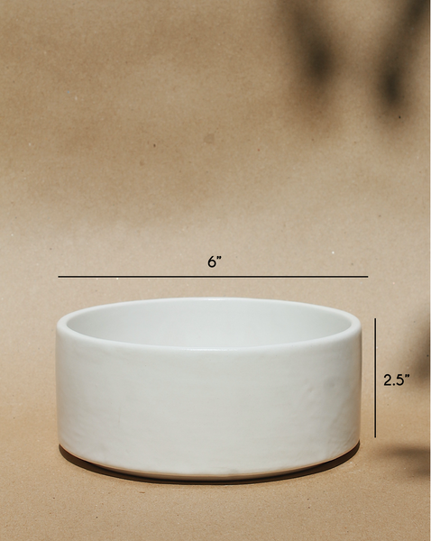 White meal bowl with brown background