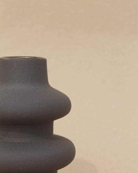 Textured matte finish sculptural vase for table top